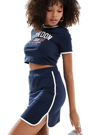 Pieces® Sport Core - Minigonna con finiture a contrasto bianche in coordinato
