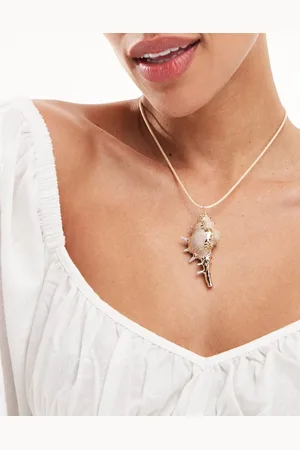 ASOS Collana in corda color crema con pendente a conchiglia finta