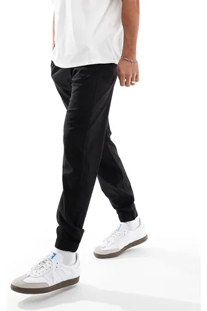 Hollister Joggers skinny in nylon e cotone neri con orlo elasticizzato