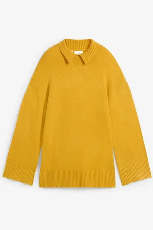 bonprix Maglione oversize a collo alto con spacchi laterali