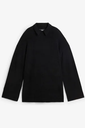 bonprix Maglione oversize a collo alto con spacchi laterali