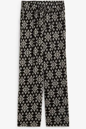 bonprix Pantaloni in viscosa crinkle fantasia con cinta comoda a vita alta