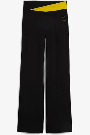 bonprix Pantaloni sportivi in cotone, svasati