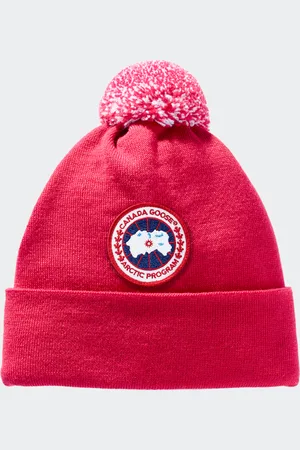 Canada Goose Toque con pon pon in lana merino da bambino
