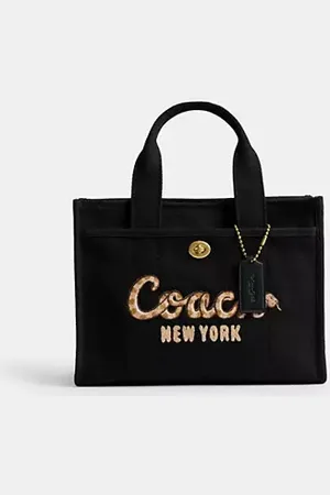 Coach Borsa larga Cargo 26 Capodanno con scritta a serpentina