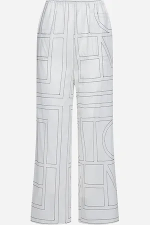 Totême Pantaloni misto cotone a stampa Monogram