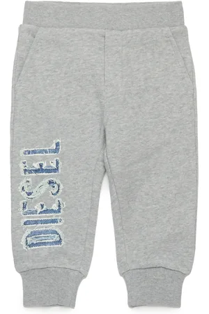 Diesel Pantaloni tuta con logo in denim sfrangiato Pantalone Uomo