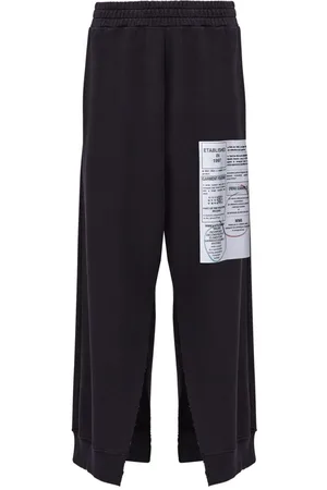Maison Margiela | Pantaloni sportivi neri con dettagli cut | female | | S
