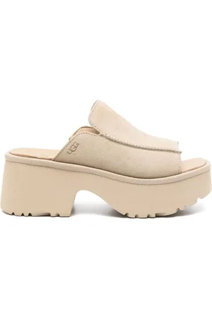 UGG | Mules platform New Heights | female | | 5