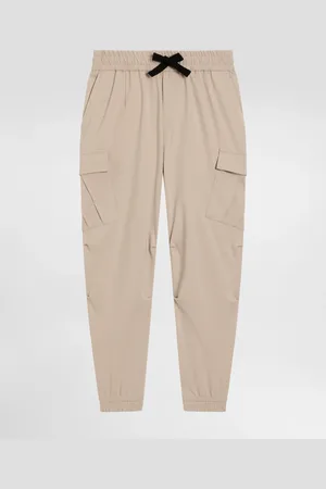 Dolce & Gabbana Pantaloni Cargo In Jersey Stretch Con Placca Logata - Uomo Pantaloni E Shorts Beige 5 Years