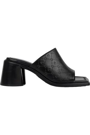 Marine Serre Mules in pelle goffrata in