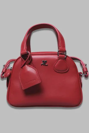 Courrèges Ac stud mini bowling bag