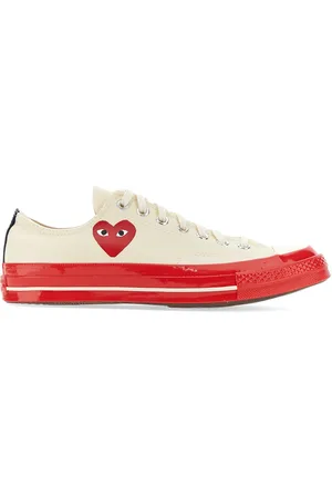 Comme des Garçons Sneaker con stampa heart
