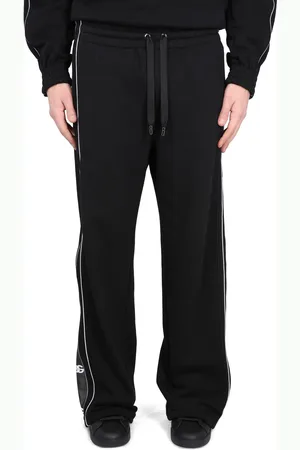 Dolce & Gabbana Pantalone jogging con bande logate