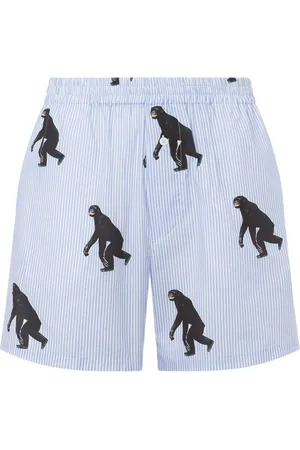 Moschino Shorts a righe con stampa grafica