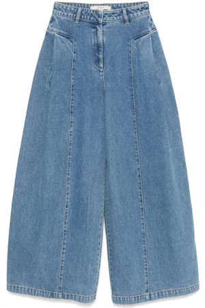 REMAIN Jeans a gamba ampia