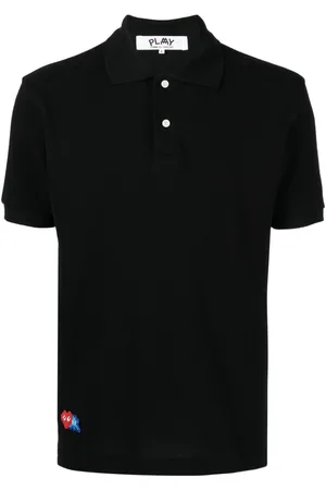 Comme des Garçons Polo con applicazione X Invader