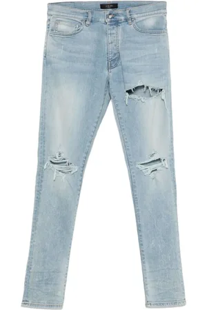 AMIRI Jeans con effetto vissuto