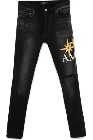 AMIRI Jeans con applicazione Starburst