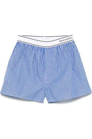 Sporty & Rich Shorts con banda logo
