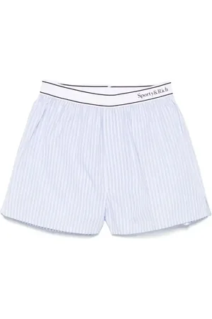 Sporty & Rich Shorts con banda logo