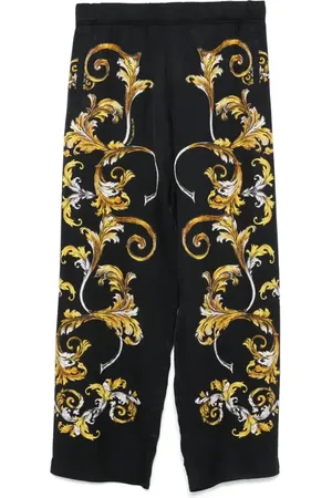 VERSACE Pantaloni con stampa Barocco