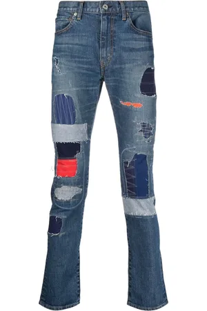 JUNYA WATANABE Jeans slim con design patchwork