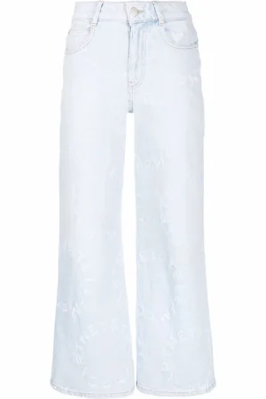 Stella McCartney Jeans crop Stella Logo con effetto vissuto