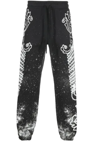 VERSACE Pantaloni sportivi con stampa