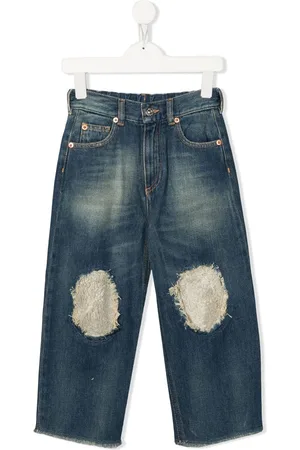 Maison Margiela Jeans a gamba ampia con applicazione