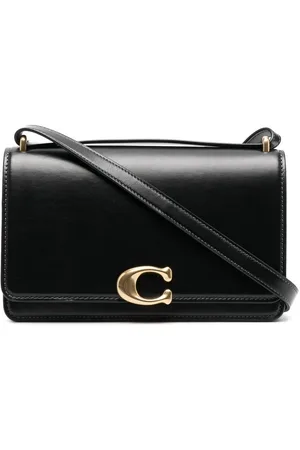 Coach Borsa a spalla con placca logo