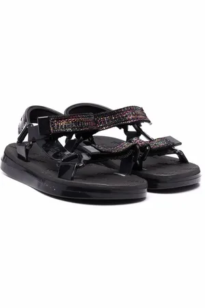 Melissa Sandali con strappi e dettagli metallizzati