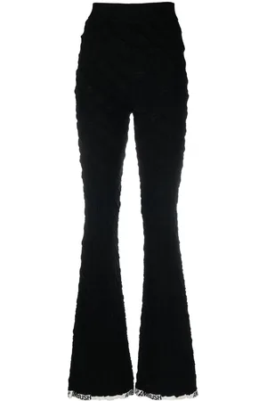 AMBUSH Pantaloni svasati con monogramma