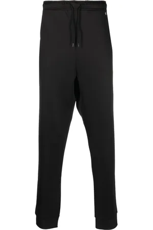 RAF SIMONS Pantaloni sportivi affusolati