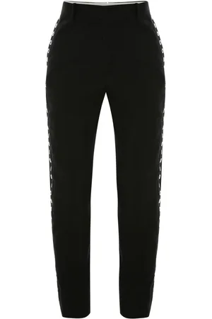 Alexander McQueen Pantaloni slim con occhielli