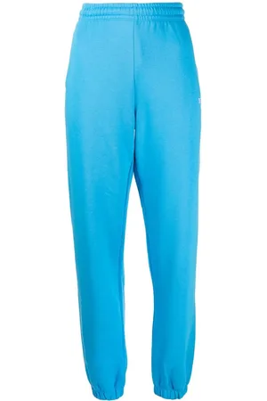 ROTATE Pantaloni sportivi affusolati con stampa