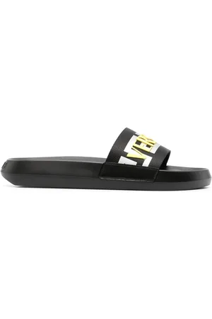 VERSACE Sandali slides La Greca con logo