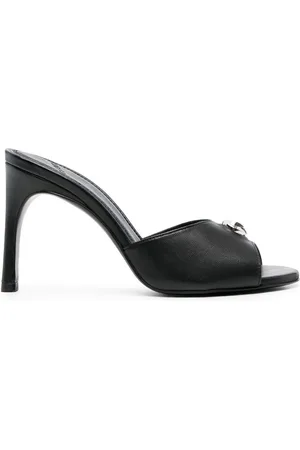 COPERNI Mules con placca logo
