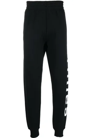 Etudes Pantaloni sportivi con stampa
