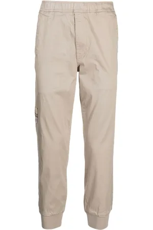 A Bathing Ape Pantaloni affusolati con stampa