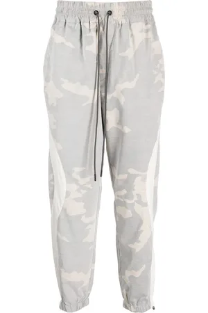 MOSTLY HEARD RARELY SEEN Pantaloni sportivi con stampa camouflage