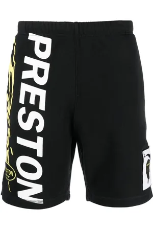 Heron Preston Shorts sportivi con stampa