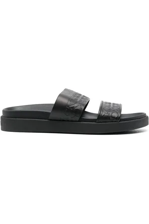 Calvin Klein Sandali slides goffrate