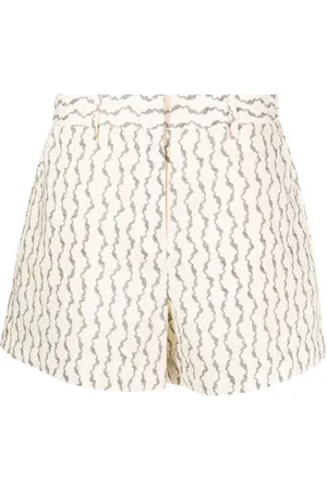 REMAIN Shorts sartoriali con stampa astratta