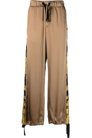 VERSACE Pantaloni con stampa Barocco