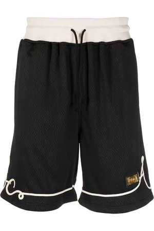 ADVISORY BOARD CRYSTALS Shorts sportivi con applicazione