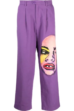 KIDSUPER STUDIOS Pantaloni a coste con stampa grafica