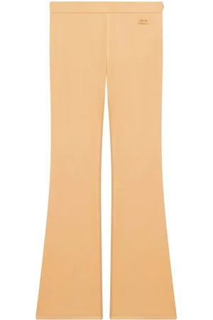 Courrèges Pantaloni svasati con ricamo