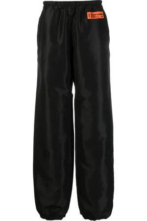 Heron Preston Pantaloni a gamba ampia con applicazione
