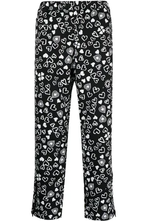 Comme des Garçons Pantaloni crop con stampa